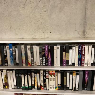 VCR TAPE AND DVDS.