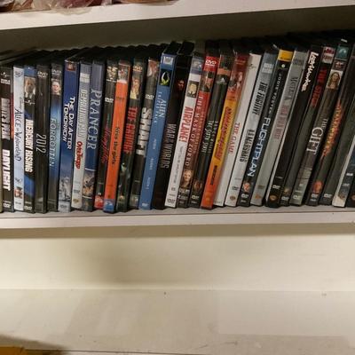 VCR TAPE AND DVDS.