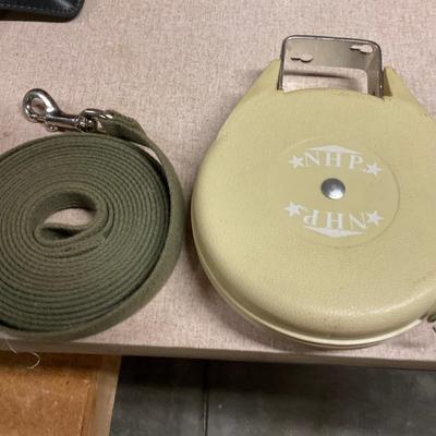 Retracting Clothes Line and Dog Training Strap.