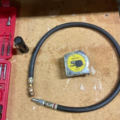 Bit Set, Air Hose, Tape Measure And Flashlight