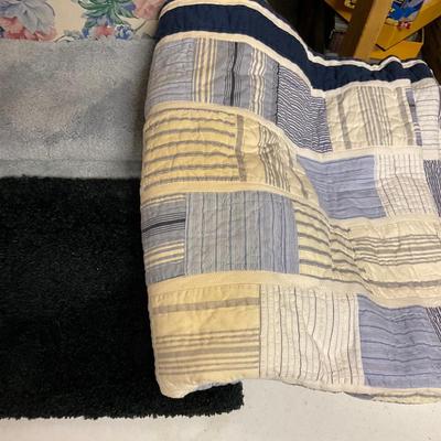 Rugs And Heavy Quilt