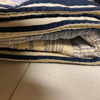 Rugs And Heavy Quilt