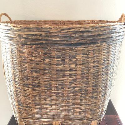 (2 baskets) blanket/ pillow holder and tall vase.