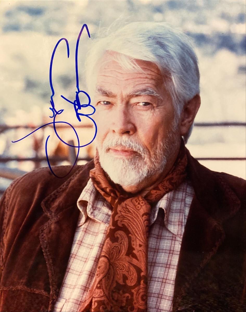 James Coburn signed photo | EstateSales.org