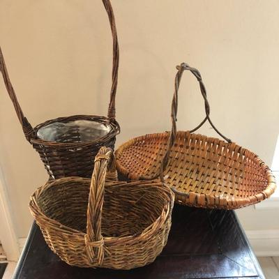 Three very old baskets.