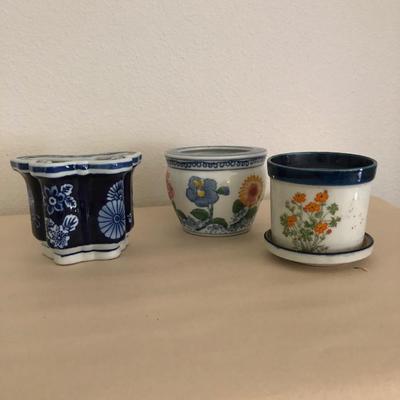 Springtime plant pots, blue candle holder.