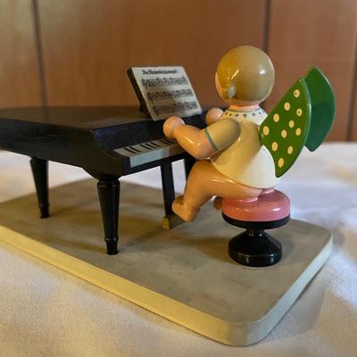 Wooden Angel at Baby Grand Piano