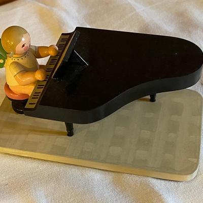Wooden Angel at Baby Grand Piano