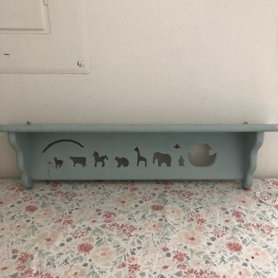 Noahâ€™s arc shelf for baby room.