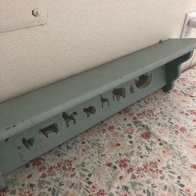 Noahâ€™s arc shelf for baby room.