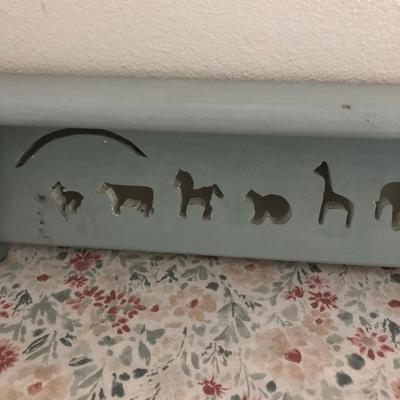 Noahâ€™s arc shelf for baby room.