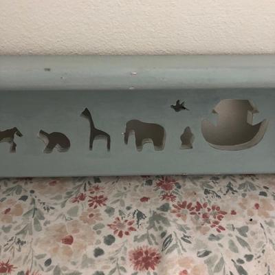 Noahâ€™s arc shelf for baby room.