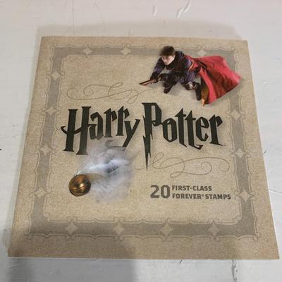 Harry Potter Forever Stamps in a folder. REAL postage stamps