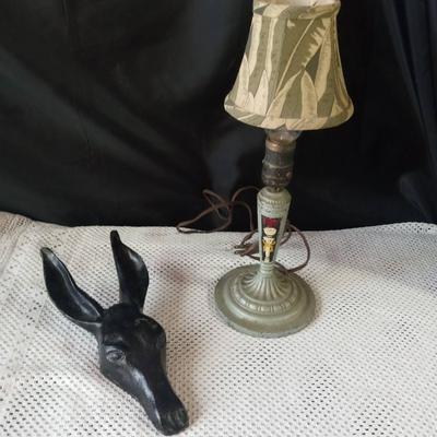 CAST IRON DONKEY BOOT REMOVER AND A METAL LAMP