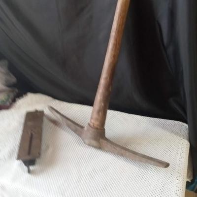 PICK AXE AND A HANGING SCALE