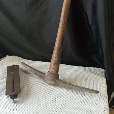 PICK AXE AND A HANGING SCALE