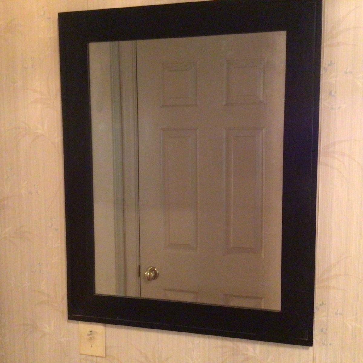735 Black Framed Wall Mirror | EstateSales.org