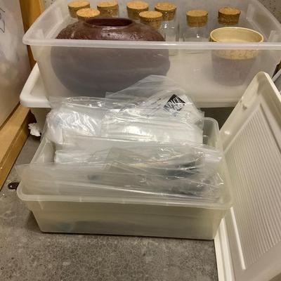 Three Storage Totes With Storage Jars, Hangers And Space Bags.