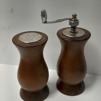 Decorative Noah's Ark Tea pot, Wooden salt & pepper mills, and a Blue Jay figure stealing vegetables.