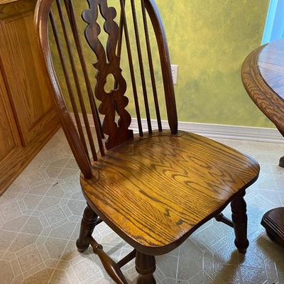 Solid oak table with one leaf and six chairs