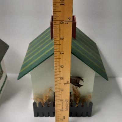 Two wooden bird house decorations