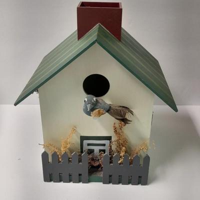 Two wooden bird house decorations