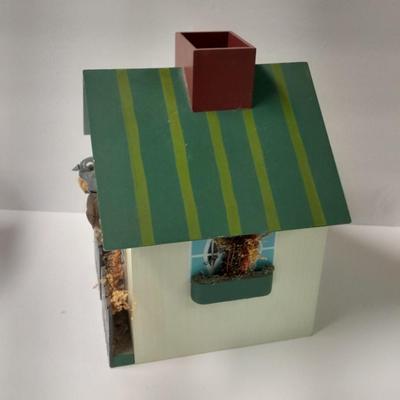 Two wooden bird house decorations