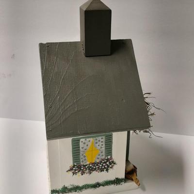 Two wooden bird house decorations