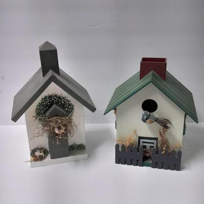 Two wooden bird house decorations