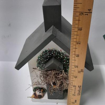 Two wooden bird house decorations