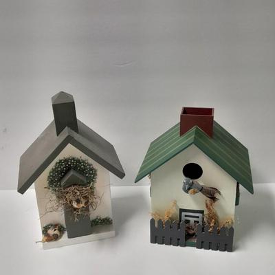 Two wooden bird house decorations