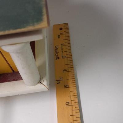 Birdhouse with small bird