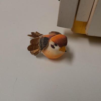 Birdhouse with small bird