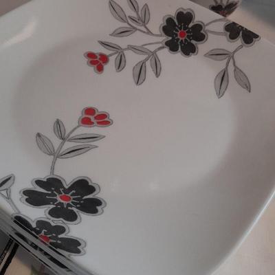 Corelle Vitrelle Dish set for six with Andre Richard Co linen napkins.