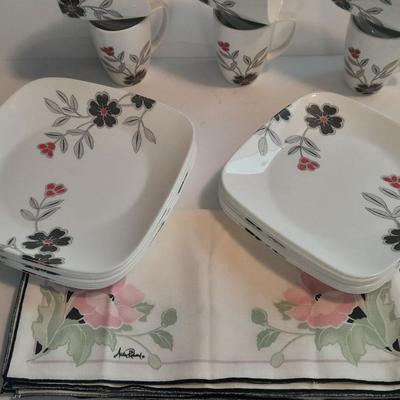 Corelle Vitrelle Dish set for six with Andre Richard Co linen napkins.