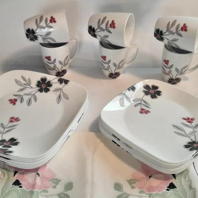Corelle Vitrelle Dish set for six with Andre Richard Co linen napkins.