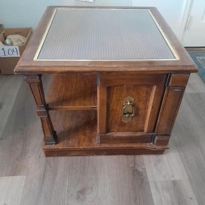 Square end table with glass top and woven / wicker design. Lots of storage! (1)
