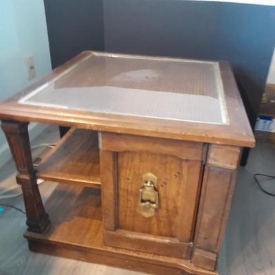 Square end table with glass top and woven / wicker design. (2)