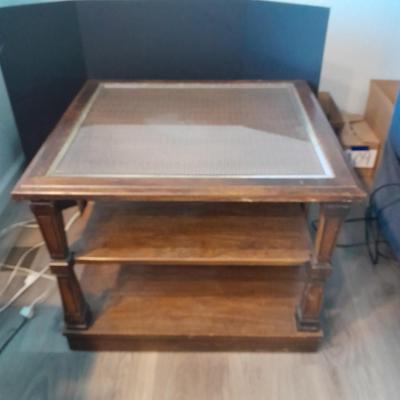 Square end table with glass top and woven / wicker design. (2)