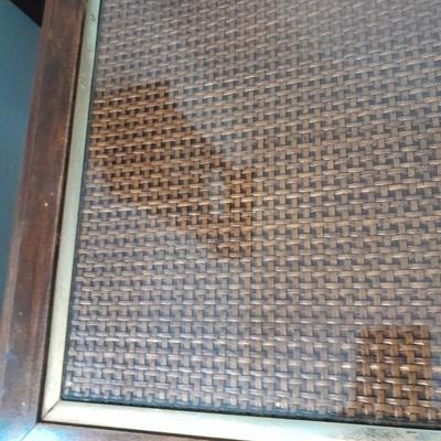 Square end table with glass top and woven / wicker design. (2)