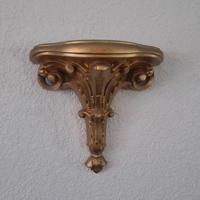 Large Gold framed beveled mirror with two MCM wall shelves.