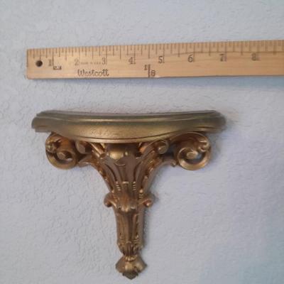 Large Gold framed beveled mirror with two MCM wall shelves.