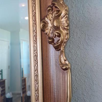 Large Gold framed beveled mirror with two MCM wall shelves.