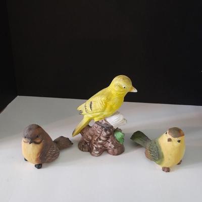 Three ceramic bird figures