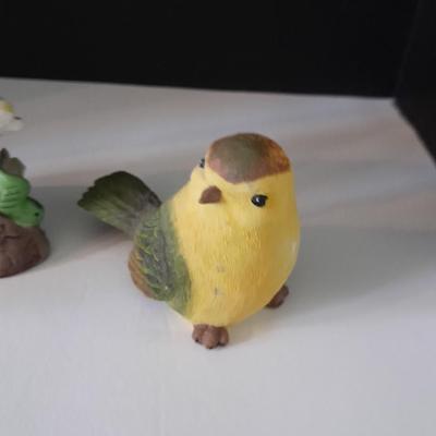 Three ceramic bird figures