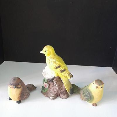 Three ceramic bird figures