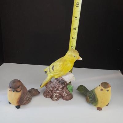 Three ceramic bird figures