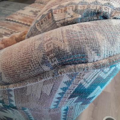 The Loren Mitchell Collection Southwestern style sofa with wood trim front