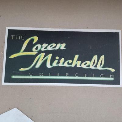 The Loren Mitchell Collection Southwestern style sofa with wood trim front