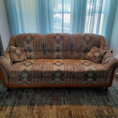 The Loren Mitchell Collection Southwestern style sofa with wood trim front